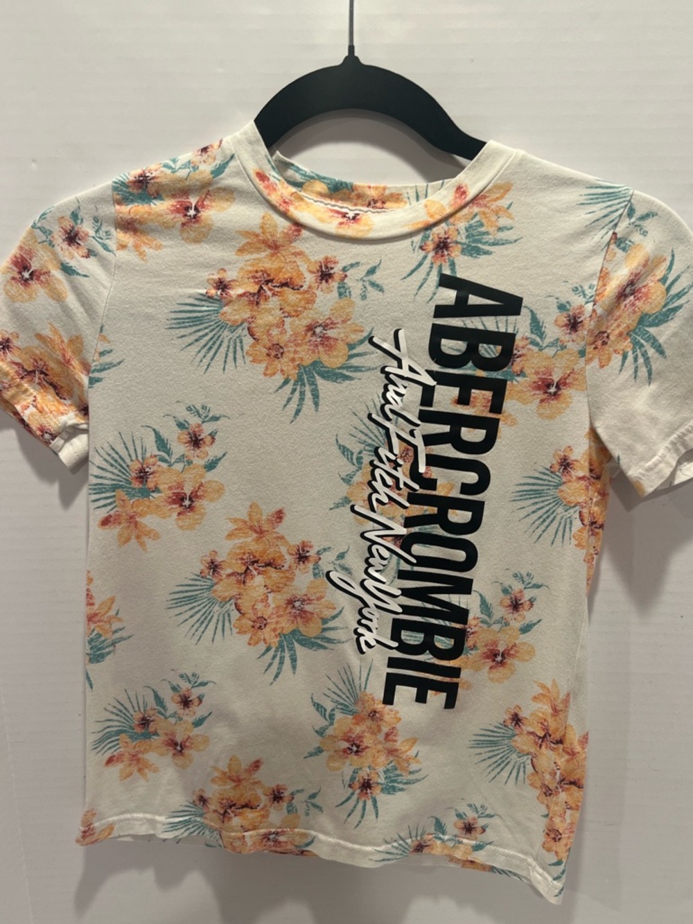 Abercrombie & Fitch Kids Girl’s Cream Floral Logo Short Sleeve New York Tee